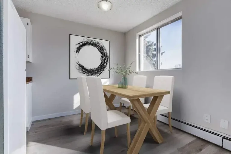 Bright dining area at Borden Place Apartments in Saskatoon.