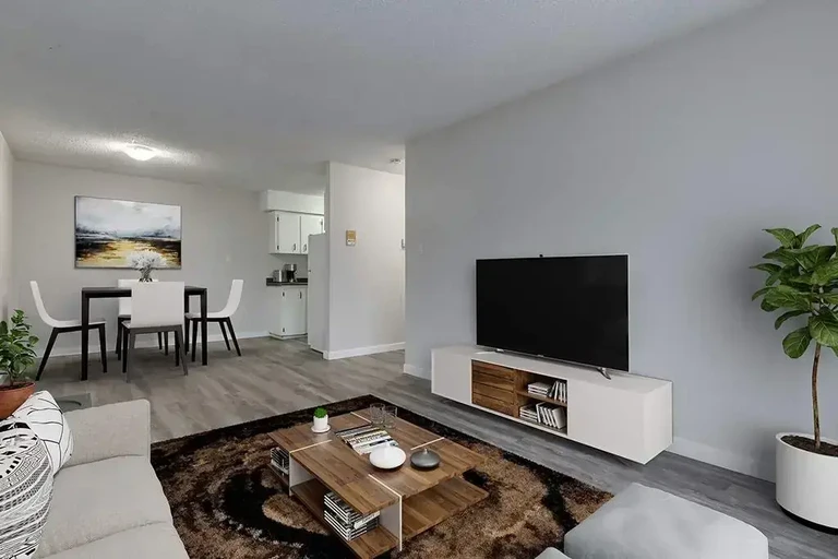 Open living room space at Caswell Manor in Saskatoon.