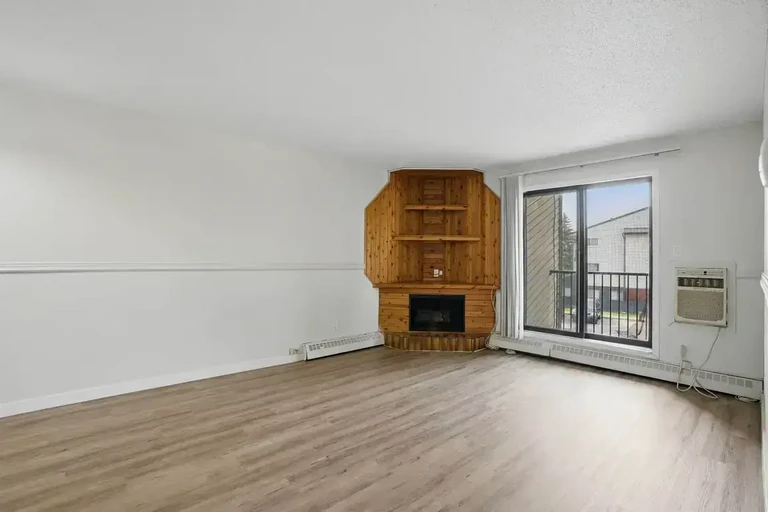 Bright living room with natural light at Chancellor Gate in Saskatoon.