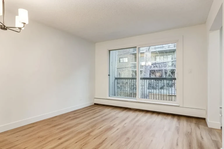 Bright living room with natural light at Cedarvilla  Apartments in Calgary.
