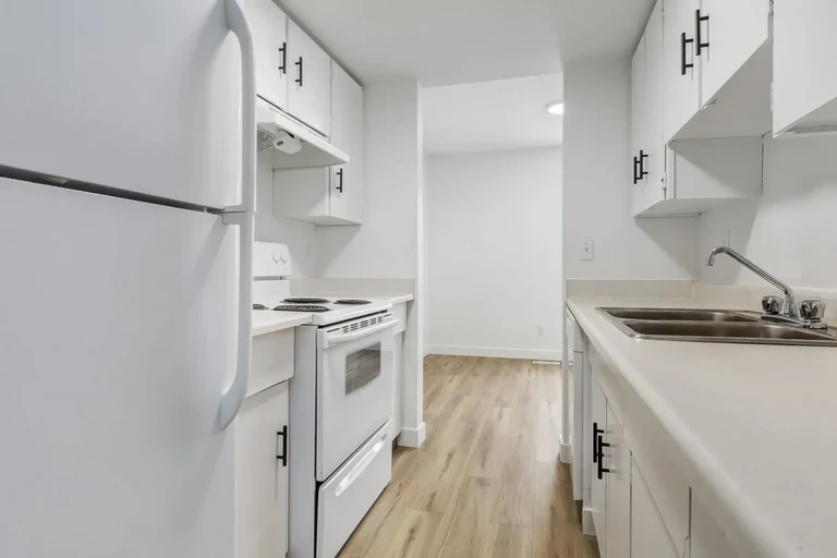 Galley style kitchen at Hartford County Townhomes in Edmonton.