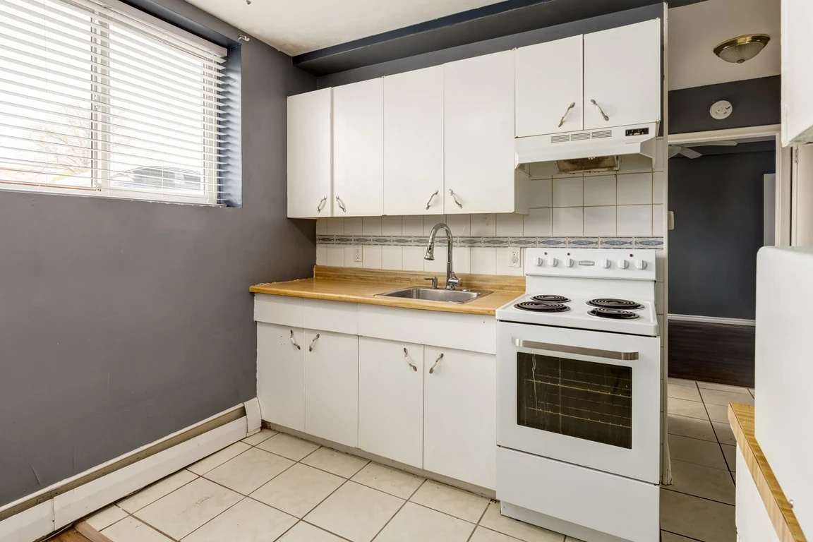 Kitchen with natural light at Kent Apartments in Edmonton.