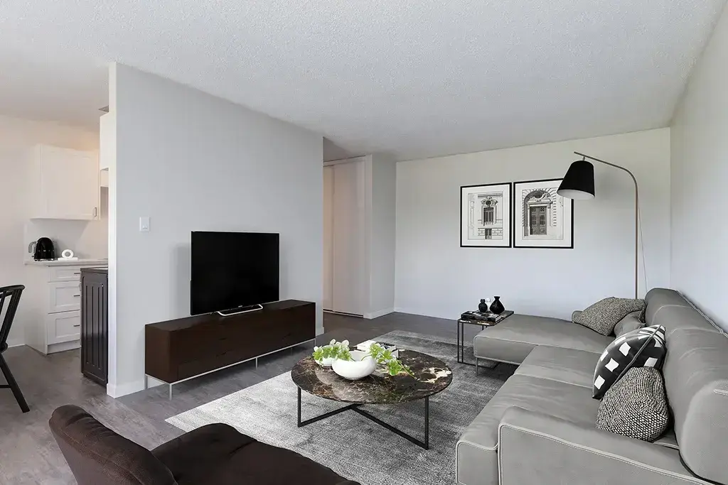 Inviting living room space at Berkeley Square in Lethbridge.