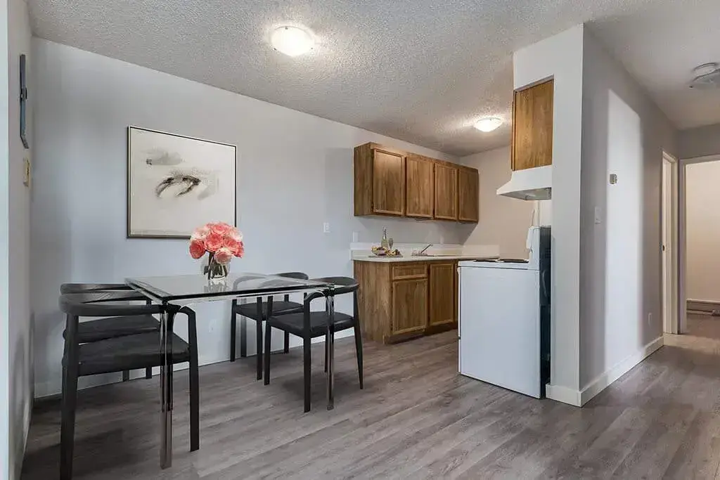 Dining area and galley style kitchen at Cloverdale Manor in Yorkton.