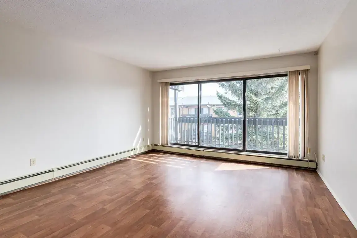 Spacious living room at Applewood Village in Calgary.