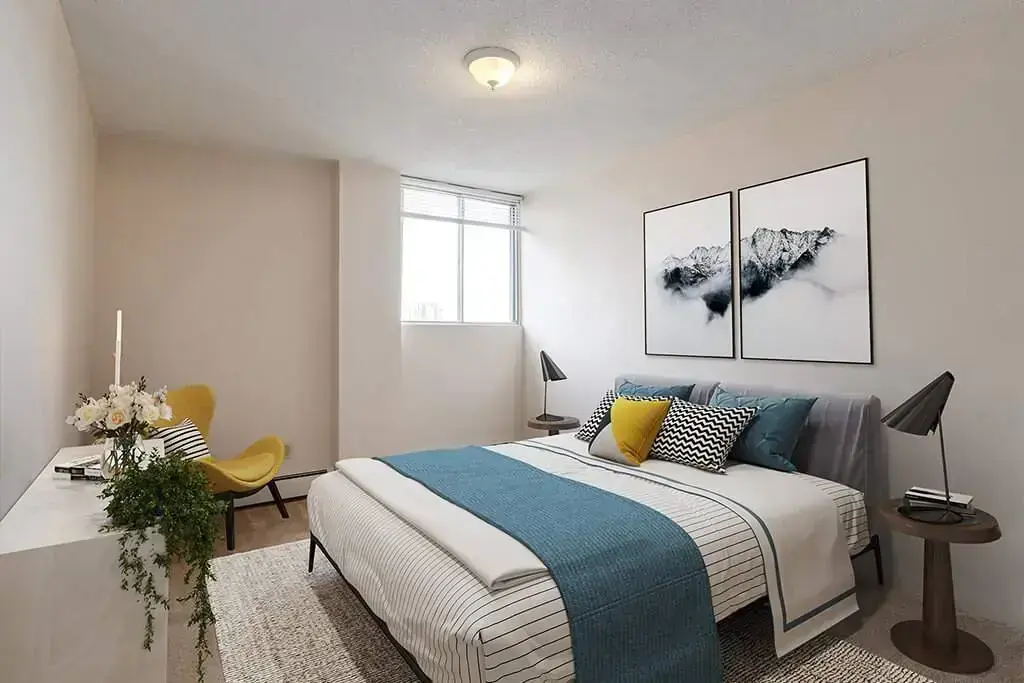 Comfortable and well-sized bedroom at Westside Apartments in Calgary.