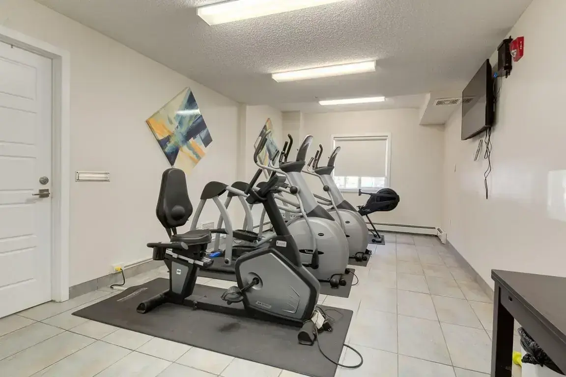 Well-equipped gym at Avalon Court in Edmonton.