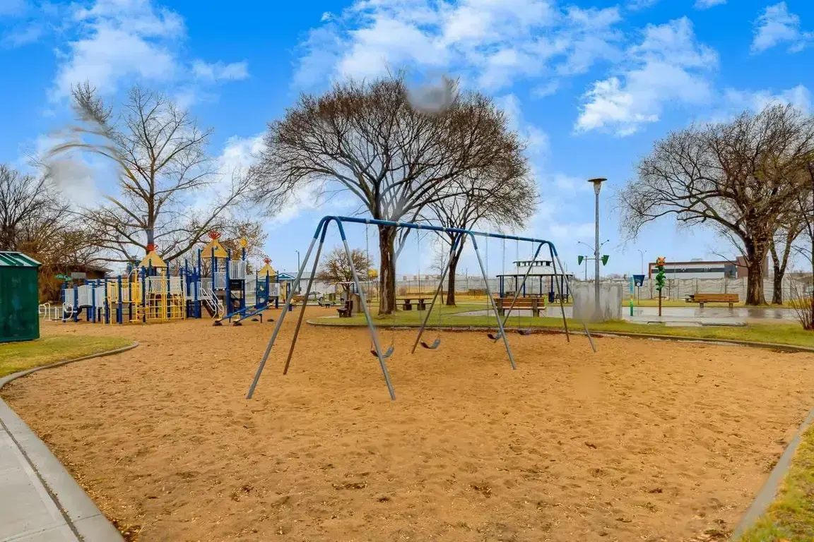Outside playground for kids at Canada West Courts in Edmonton.