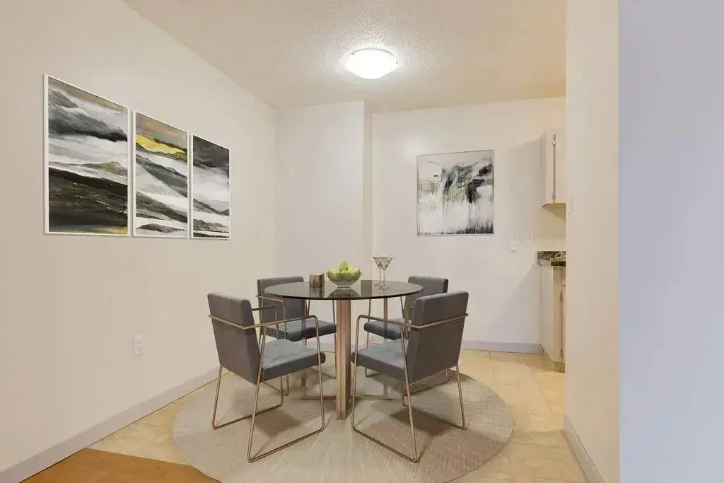 Bright dining area at Columbian Apartments in Medicine Hat.