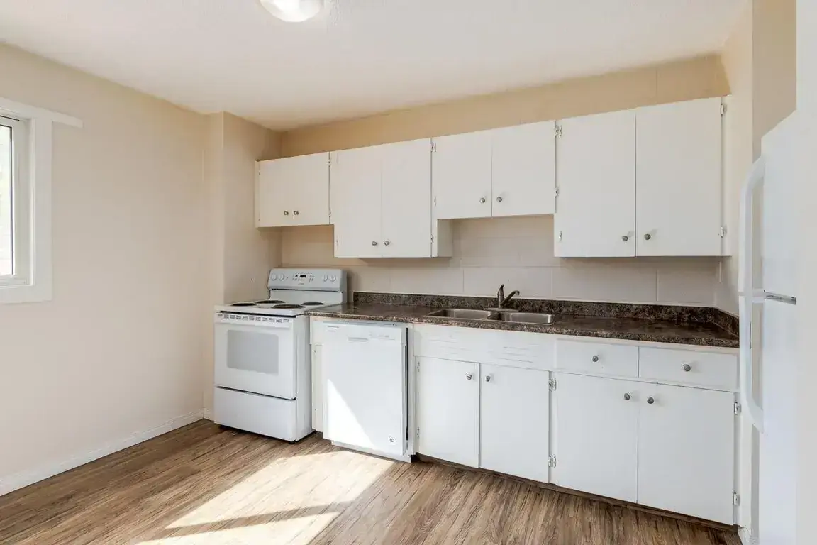 Open-layout kitchen at Parkland Townhomes in Medicine Hat.