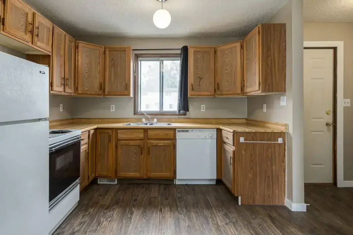 Spacious open-concept kitchen at Blue Sage Townhouses in Moose Jaw.