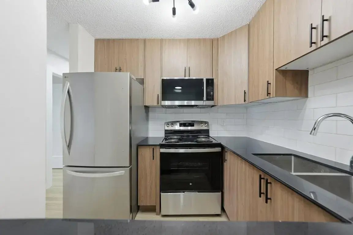 Open-concept kitchen at Alan's Place in Saskatoon.