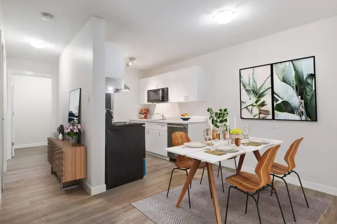Galley kitchen and dining area at Arbor Green in Saskatoon.