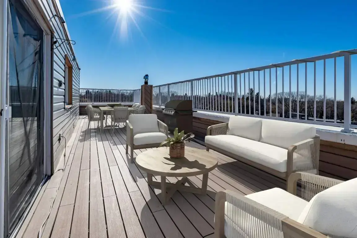 Sunlit spacious patio at Crescent Towers in Saskatoon.