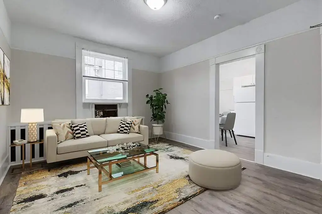 Bright living room with natural light at Rideau Classic in Saskatoon.