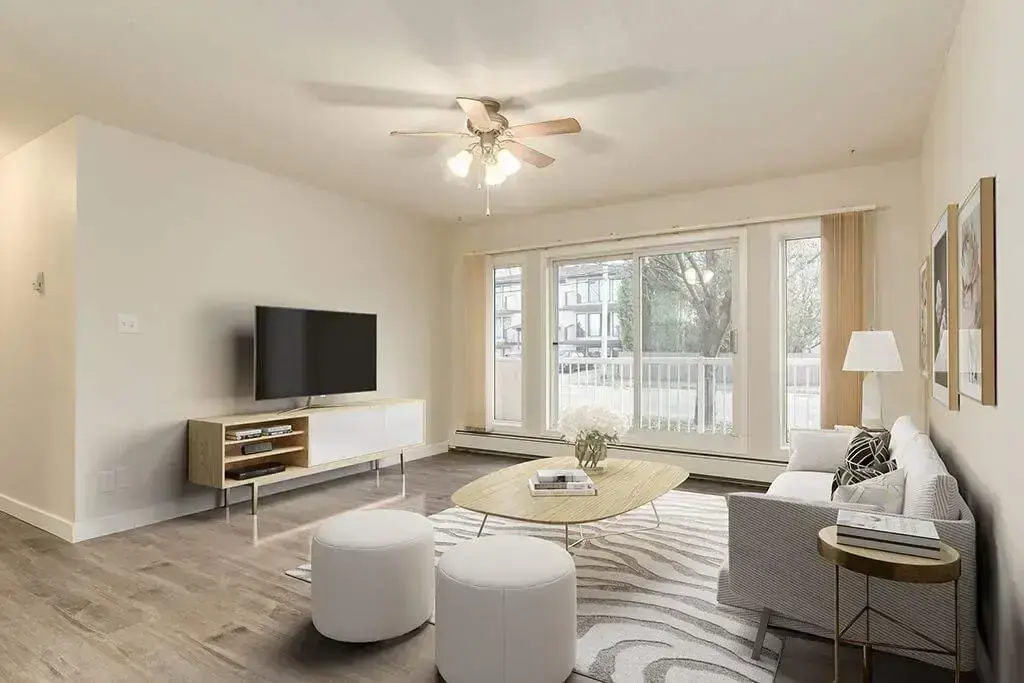 Sunlit living room at Crowchild Court in Wetaskiwin.