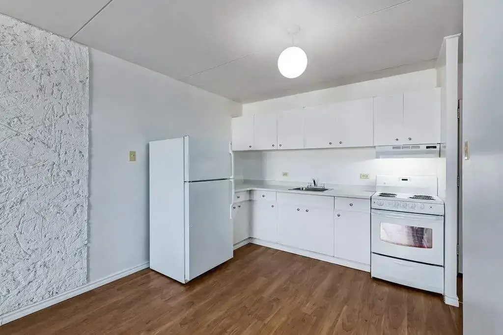 Open-layout kitchen at Red River Pointe in Winnipeg.