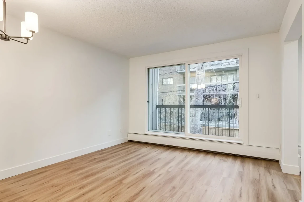 Bright living room with natural light at Cedarvilla  Apartments in Calgary.