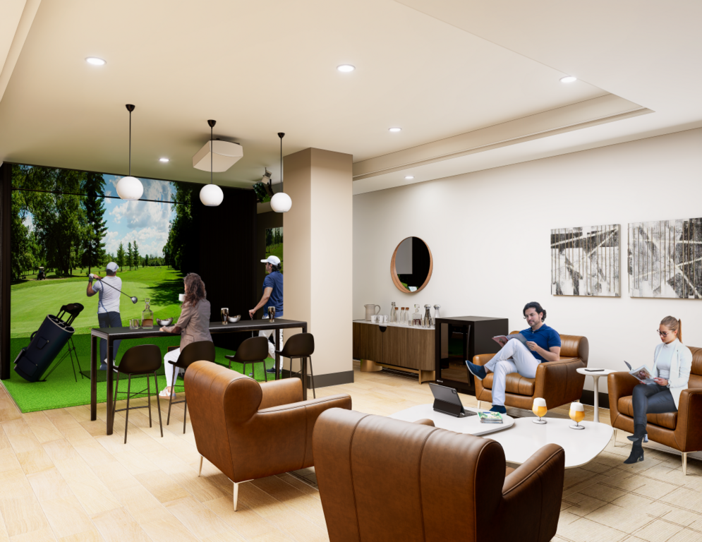 A luxury indoor golf simulator lounge at The Vantage featuring a man swinging a club on a large digital screen projecting a green fairway. The room includes a high-top bar table where a woman sits with a drink, and a lounge area with brown leather armchair