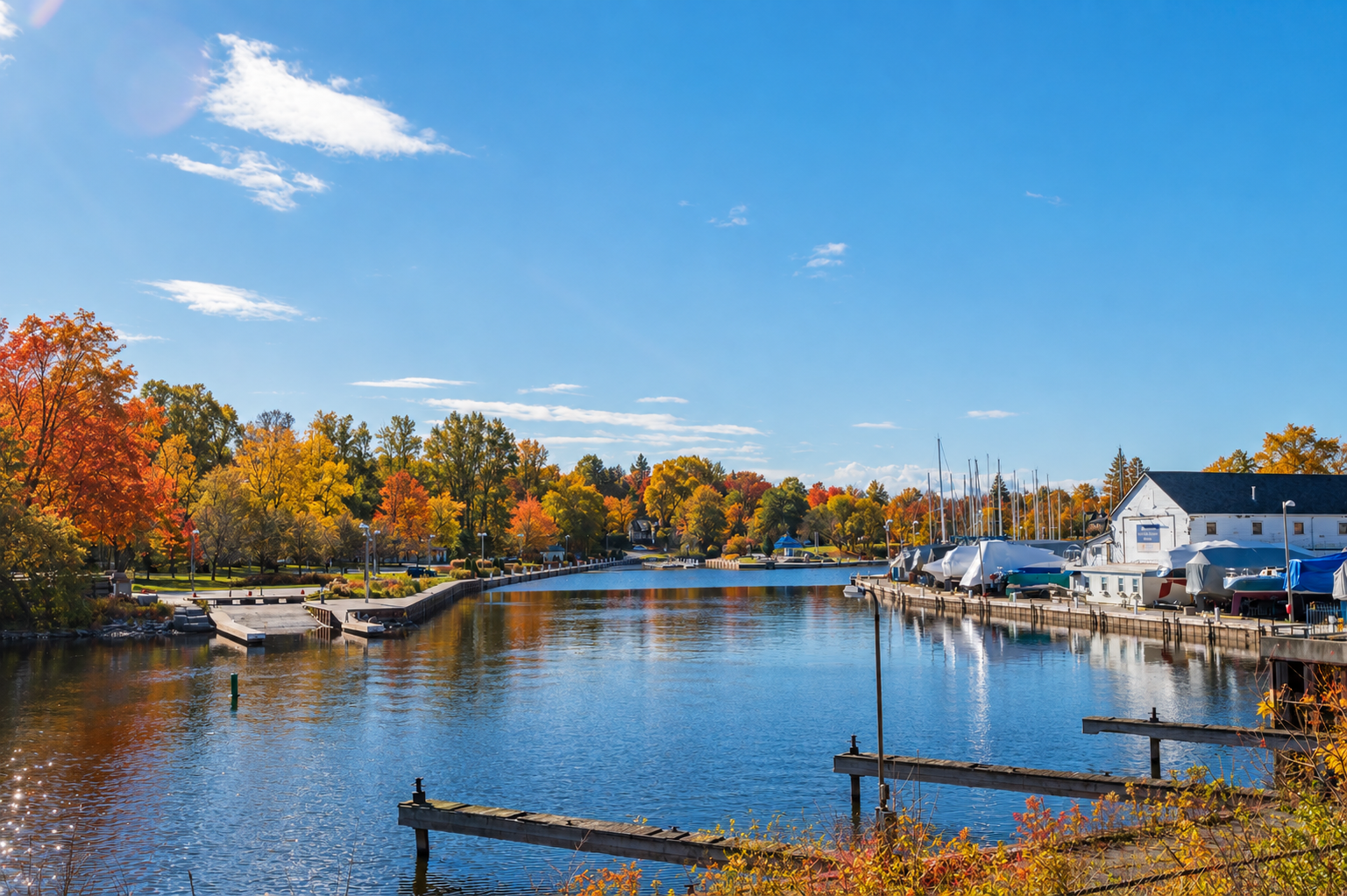 Bronte Harbour in Oakville surrounded by colourful fall foliage along the waterfront
