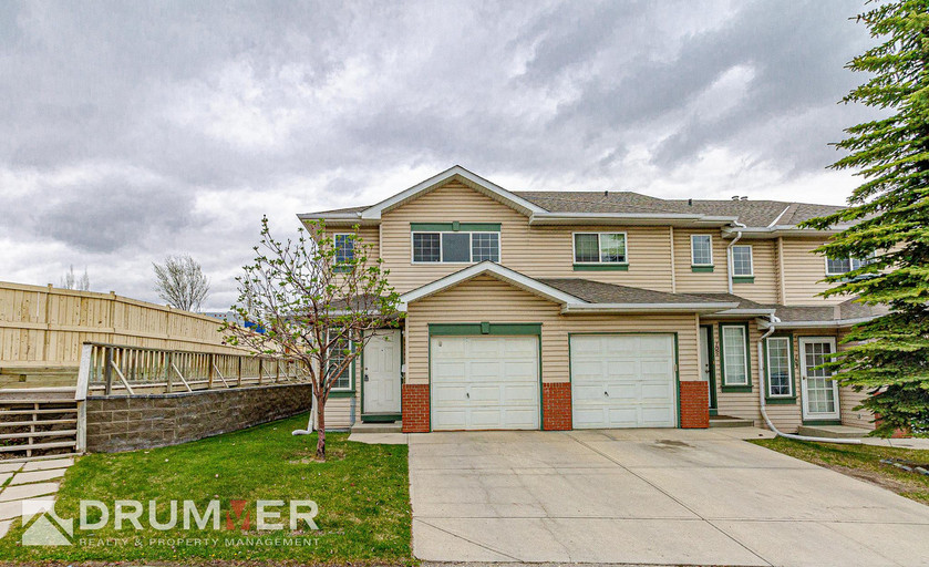 Stunning 2 Bedroom + Den Townhouse w/ Single Car Garage in Country Hills!  Featured Properties