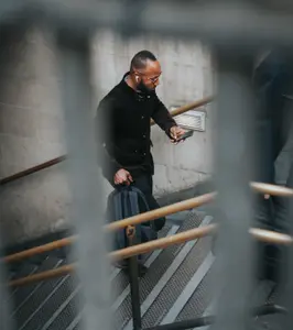 Guy walking up stairs