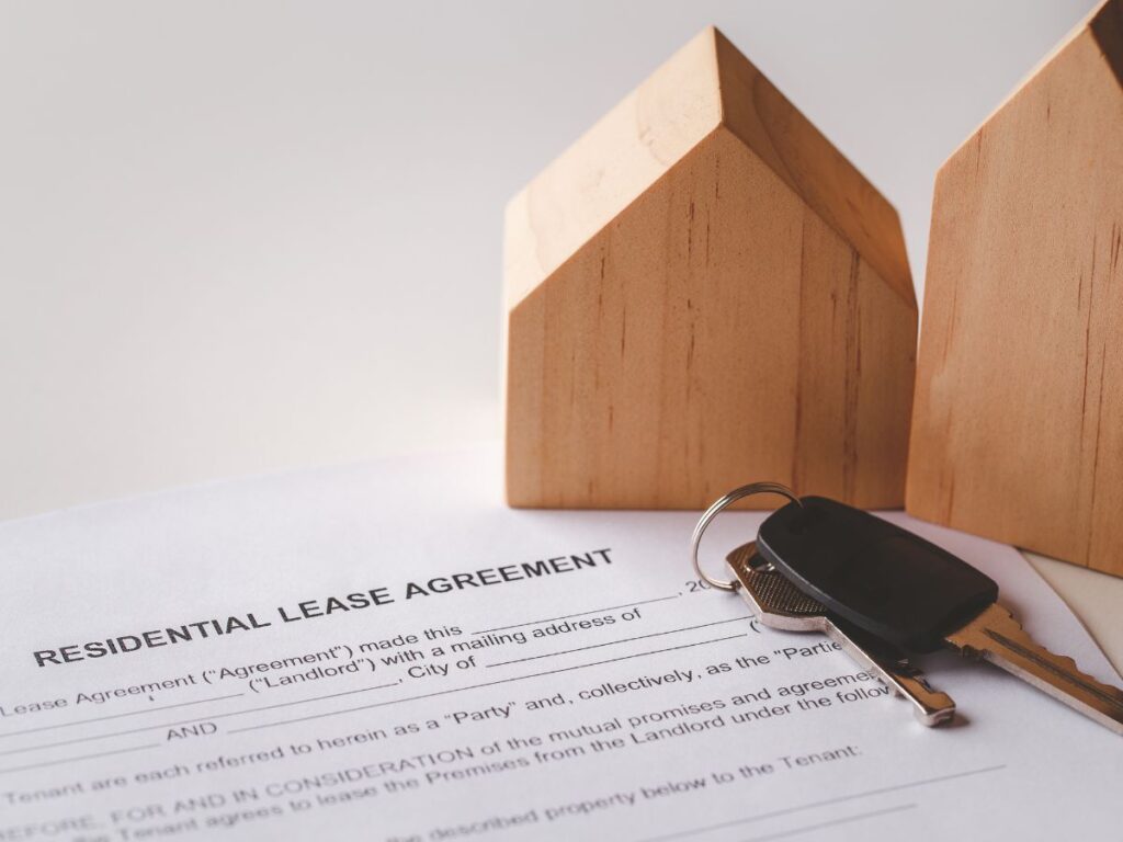 Property owner reviewing BC landlord-tenant law documents