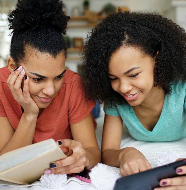 Two woman studying.