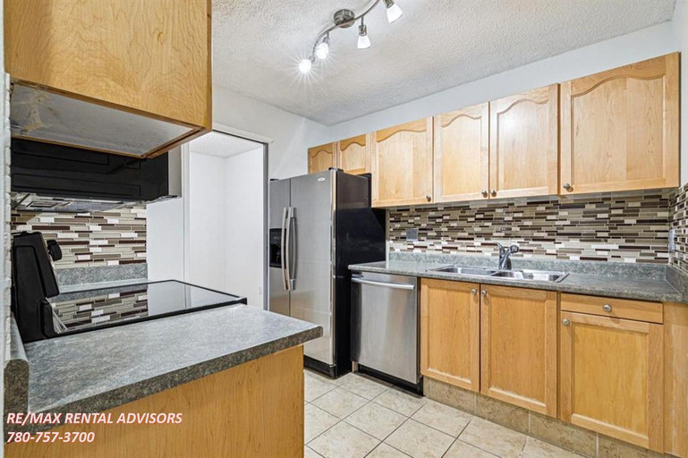 #404 537 14 Avenue Southwest