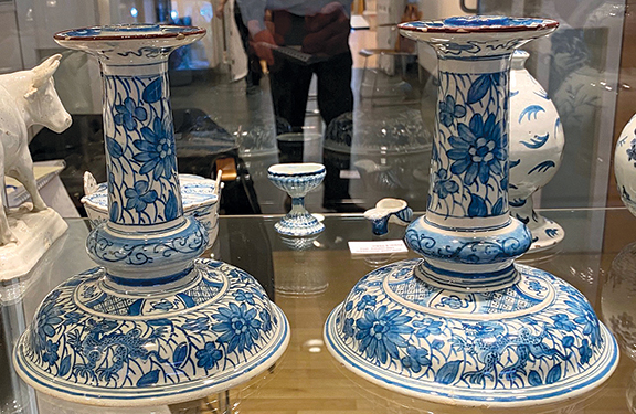 Léon-Paul van Geenen of Delft, the Netherlands, asked $9000 for this pair of Dutch Delft candlesticks decorated in the Chinese manner with a red rim.