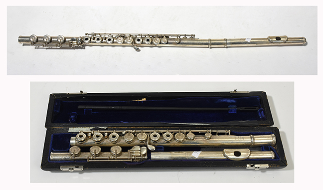 Lot 303- Silver Flute with case 