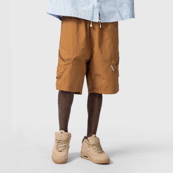 Man In The Street With Wide Leg Shorts - Image 8