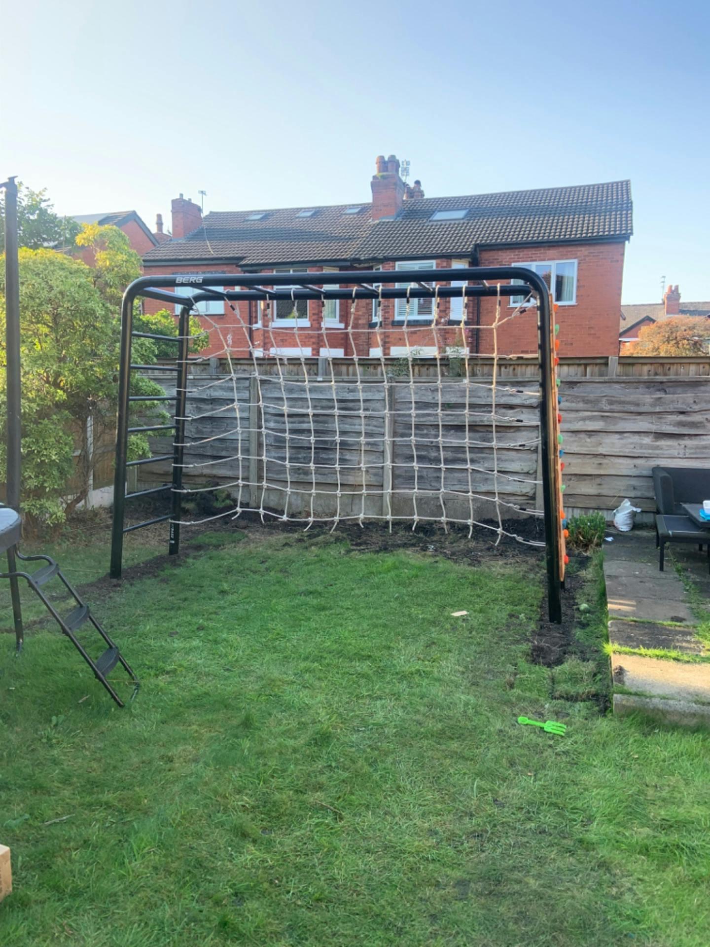 Real customer photo of a BERG PlayBase installed in a family garden
