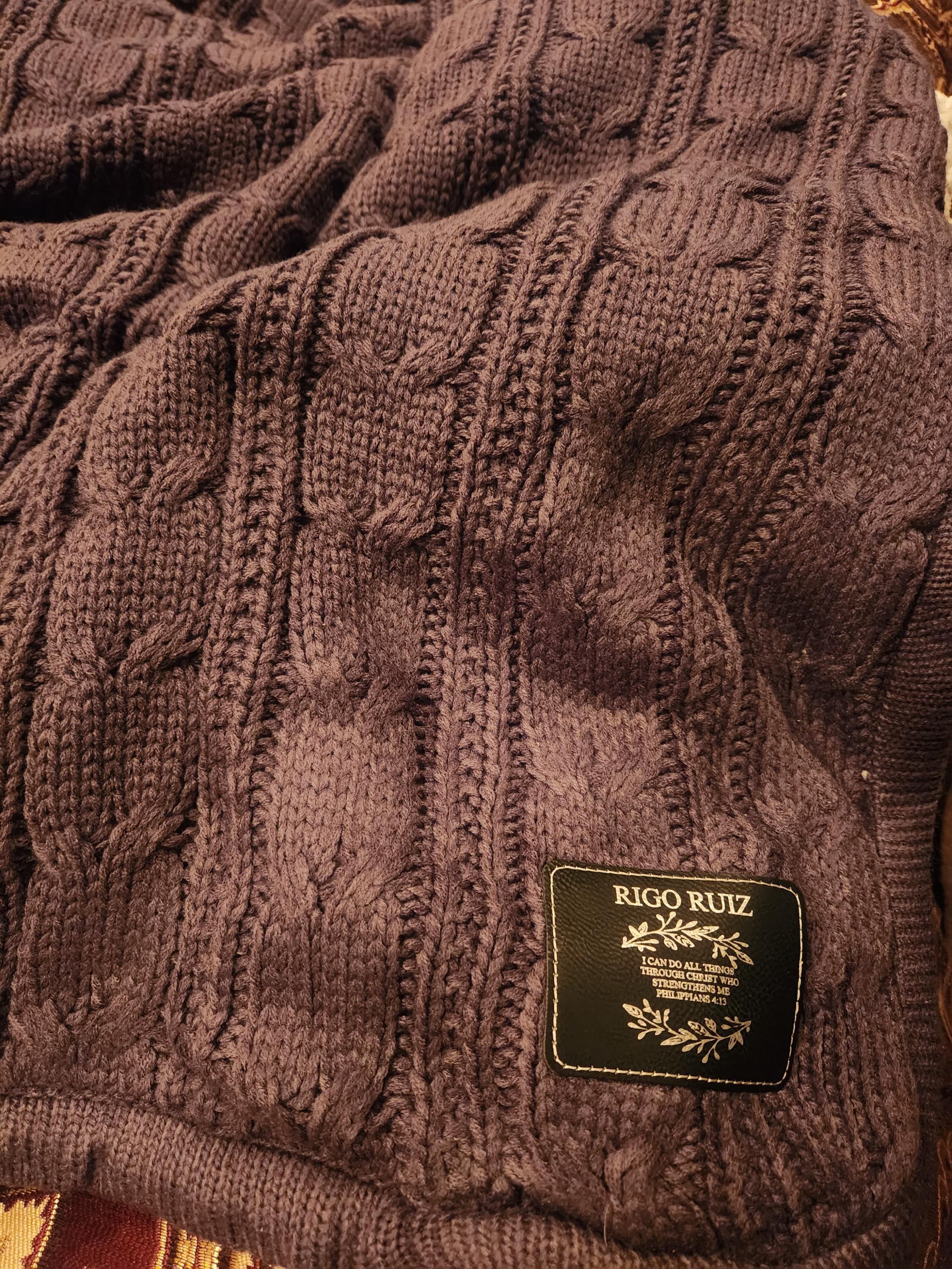 Customer photo of their cable knit blanket
