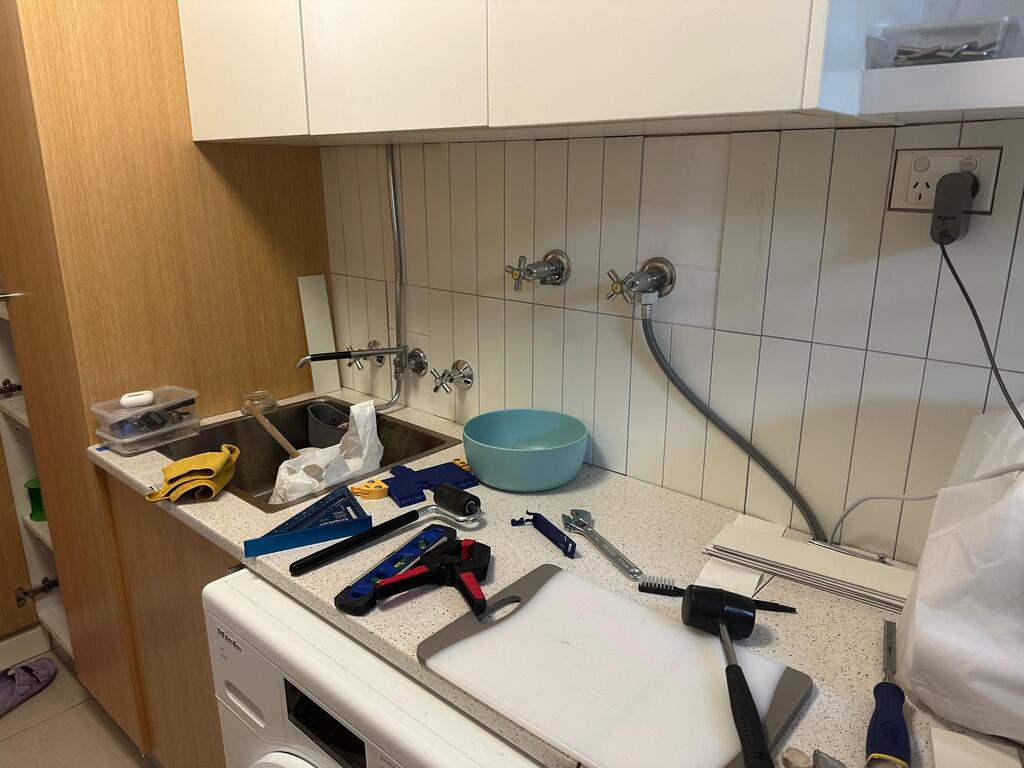 After photo 2: close-up showing grout-line coverage