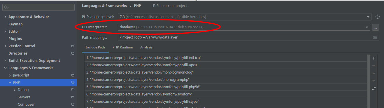 First step to integrate Docker & Xdebug is to set up an "interpreter". Clicking on the ... will allow creating a new interpreter