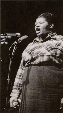 A black-and-white vertical photo on the right of the slide shows Big Mama Thornton facing slightly to our left and singing behind a microphone. She is wearing a skirt and long-sleeved plaid shirt.