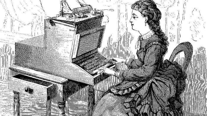 Countess Carolina sitting in front of typewriter