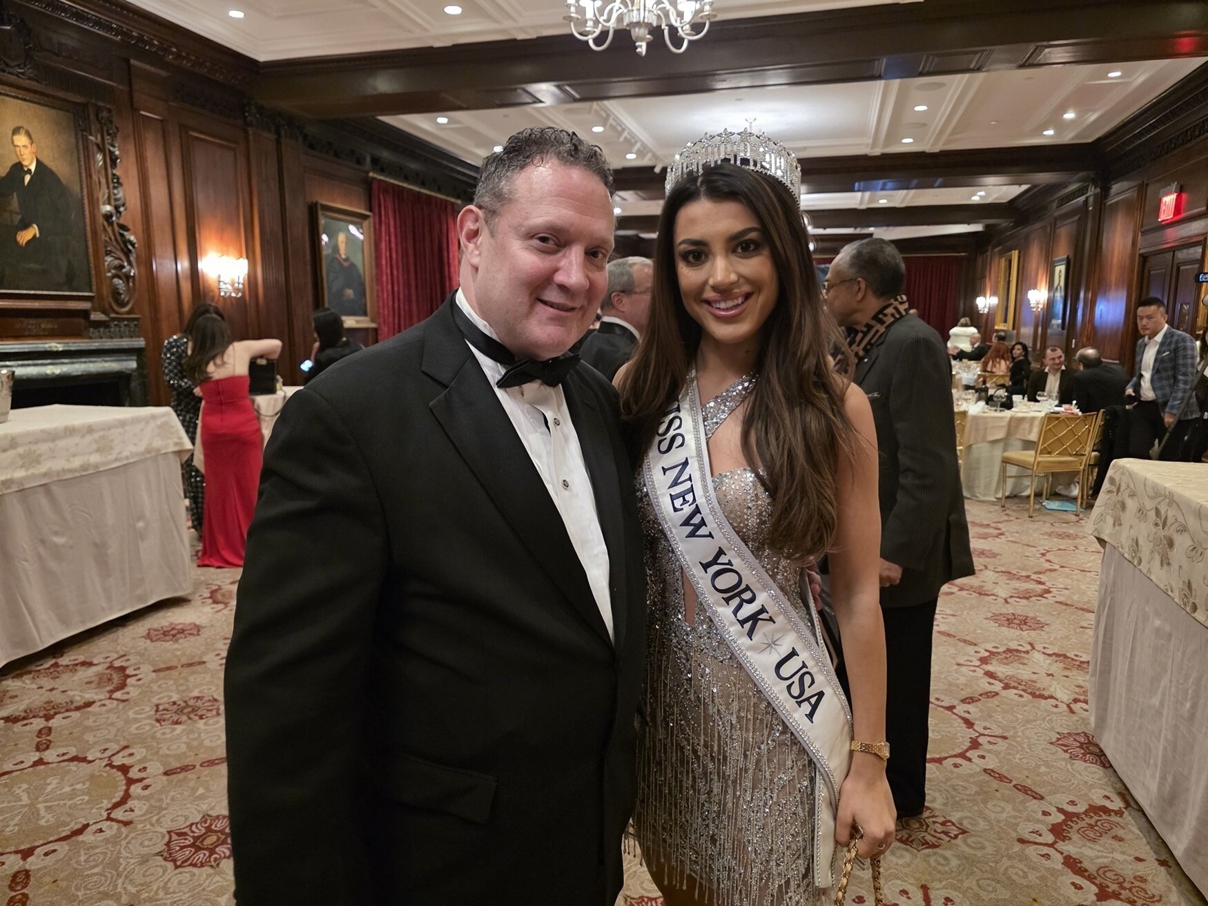 Daniel Ladner standing with Miss New York Christiana DiNardo