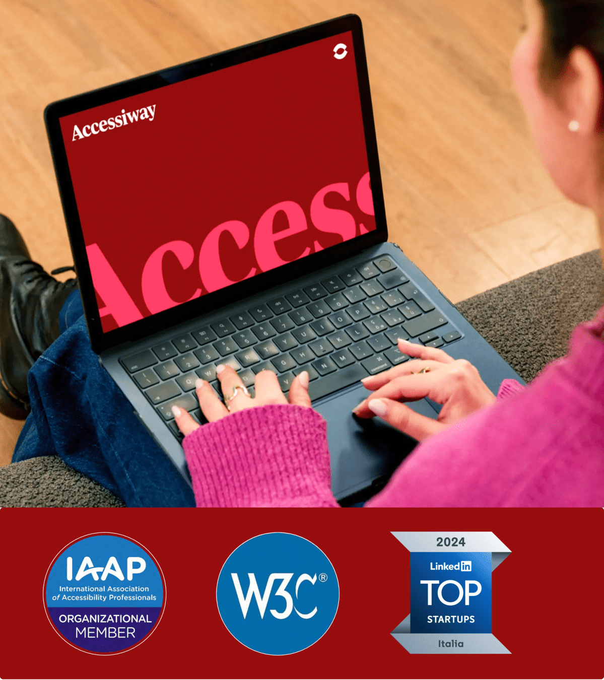 A person working on a laptop. Logos: IAAP Organizational Member, W3C, LinkedIn Top Startups Italy 2024.