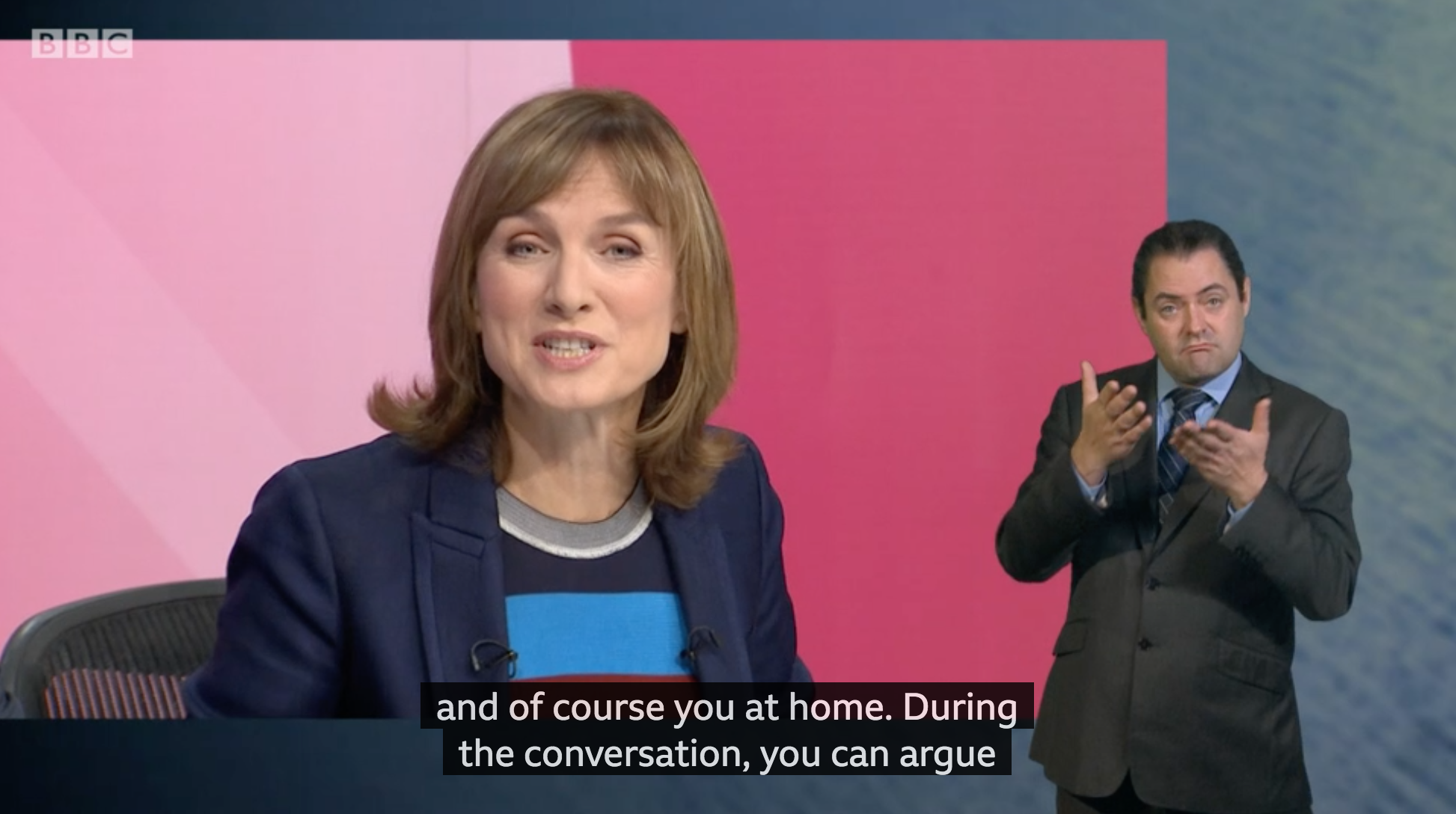 TV screenshot showing captions and sign interpreter - BBC
