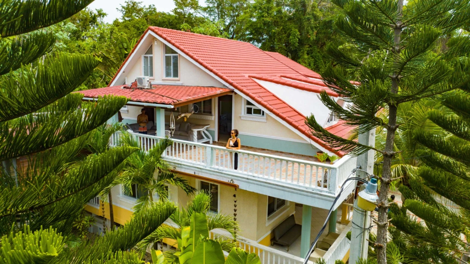 Crystal clear swimming pool at Casa Estrellas surrounded by lush greenery