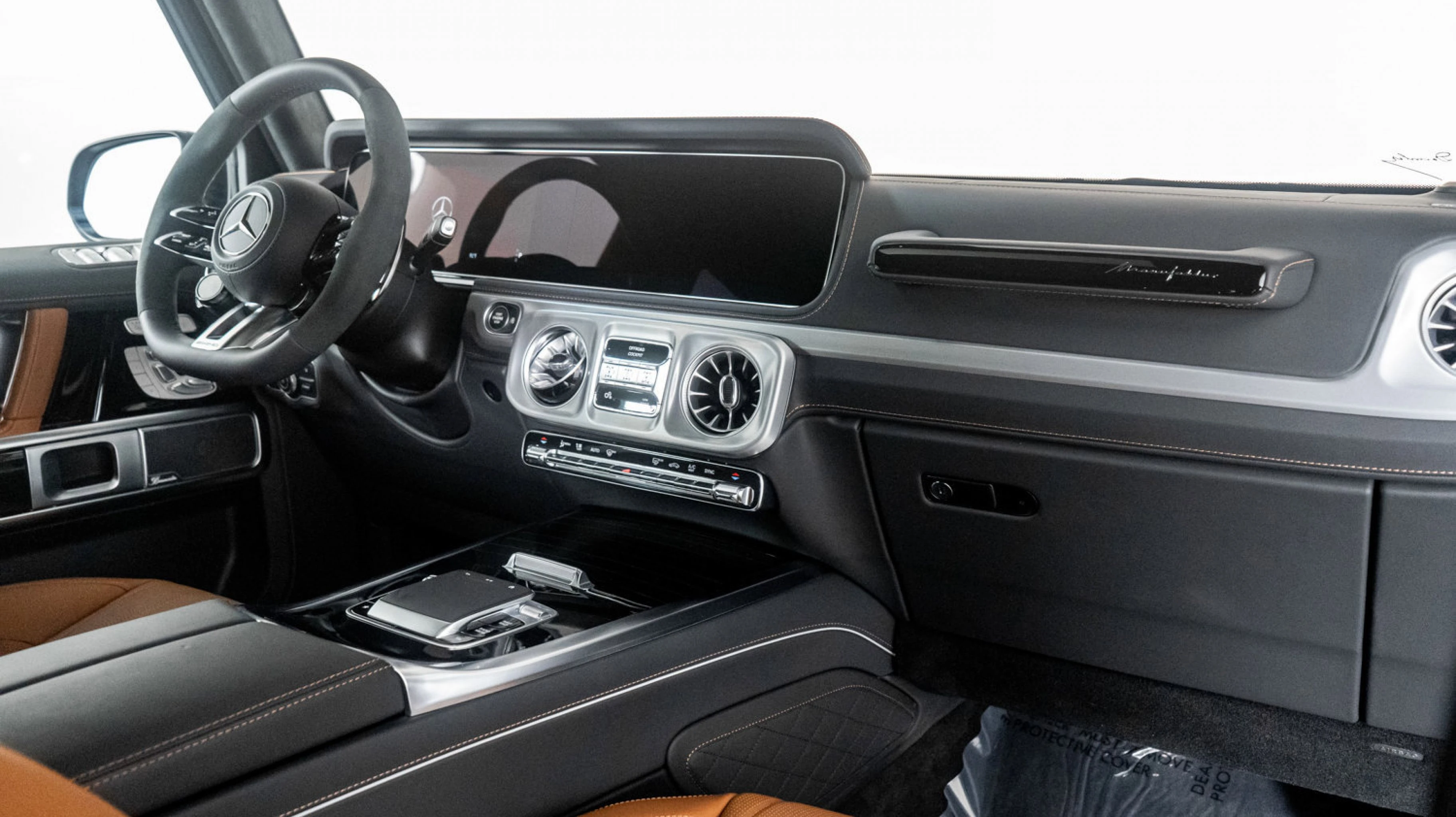 Two high-end SUVs parked together