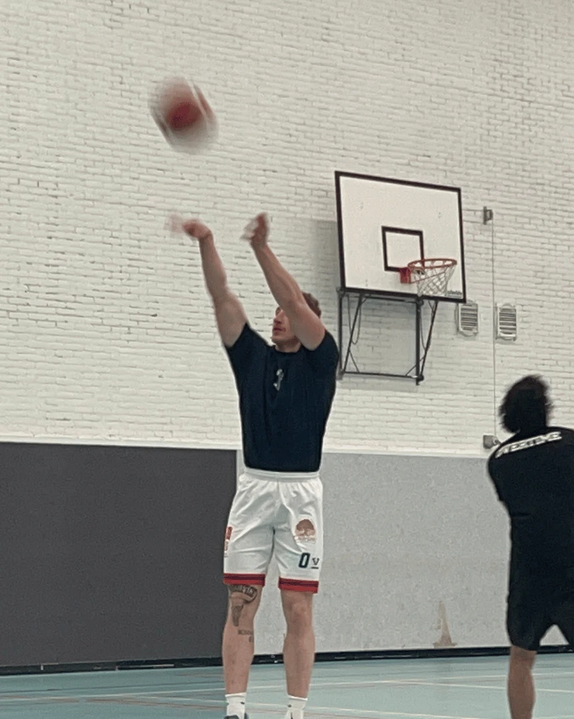Athlete focusing on shooting development mechanics
