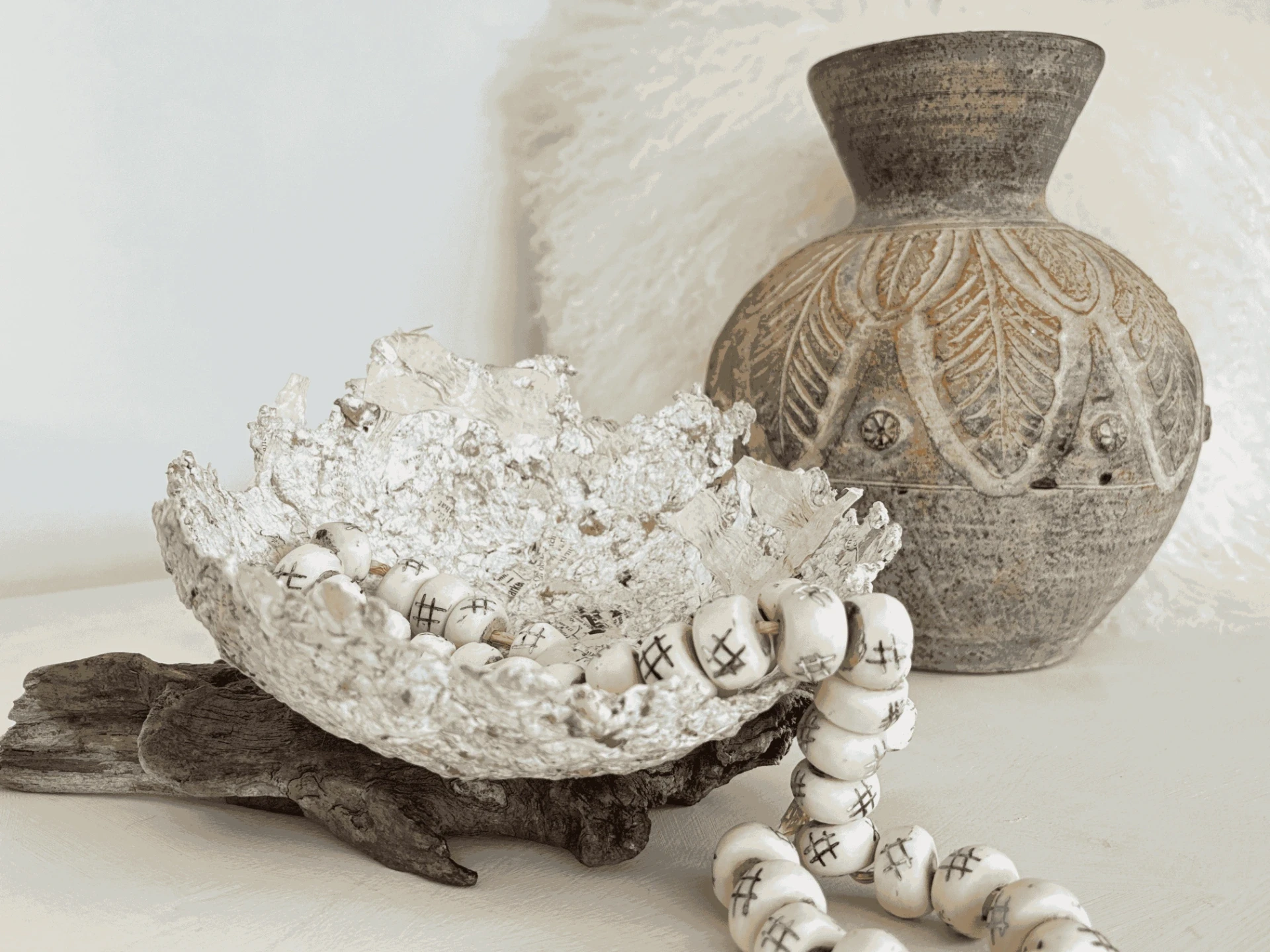 Large textured paper mache bowl showcasing earthy tones