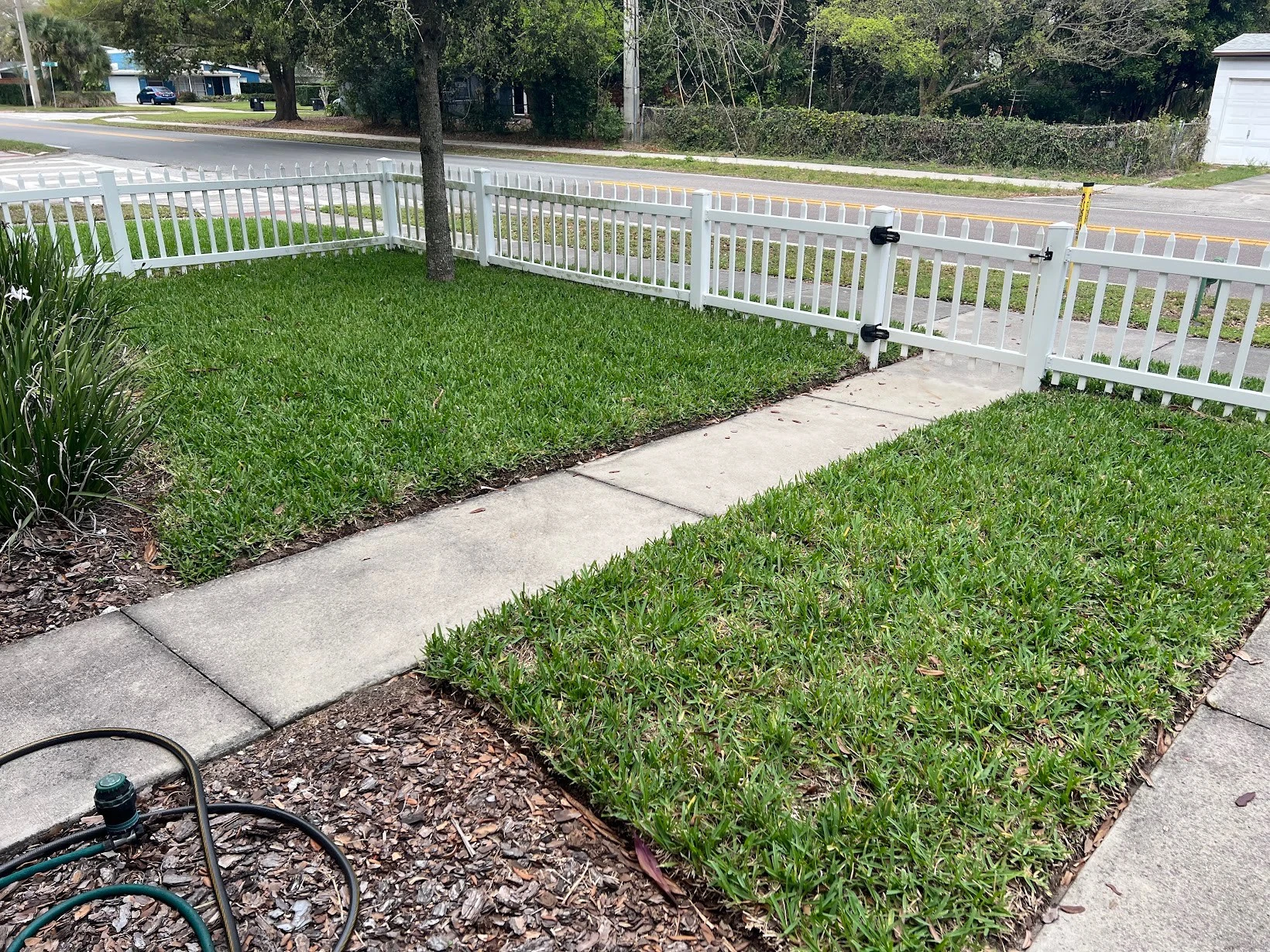 Precision cutting and fitting of sod rolls around hardscaping