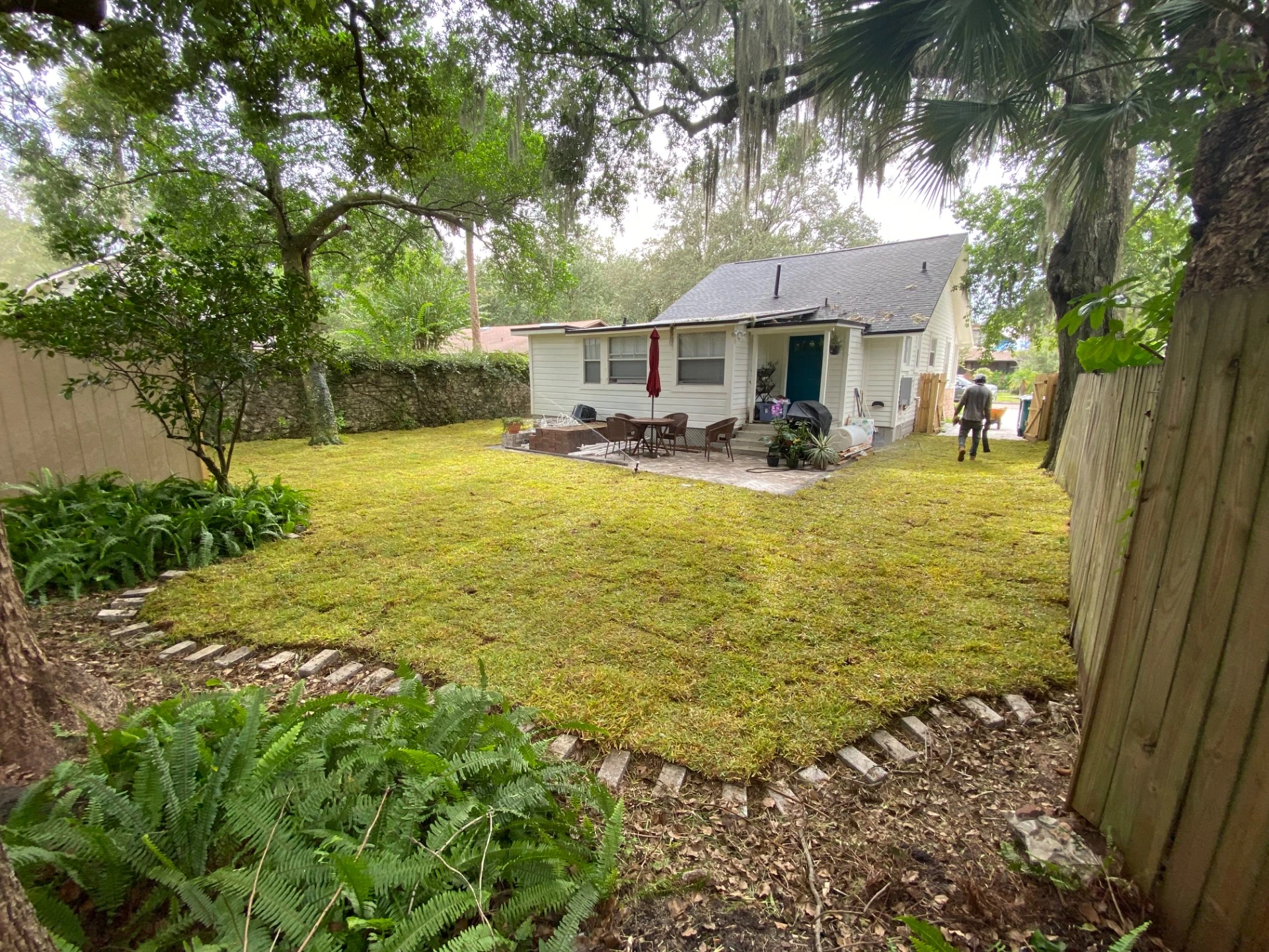 Before and after view of a commercial lawn replacement