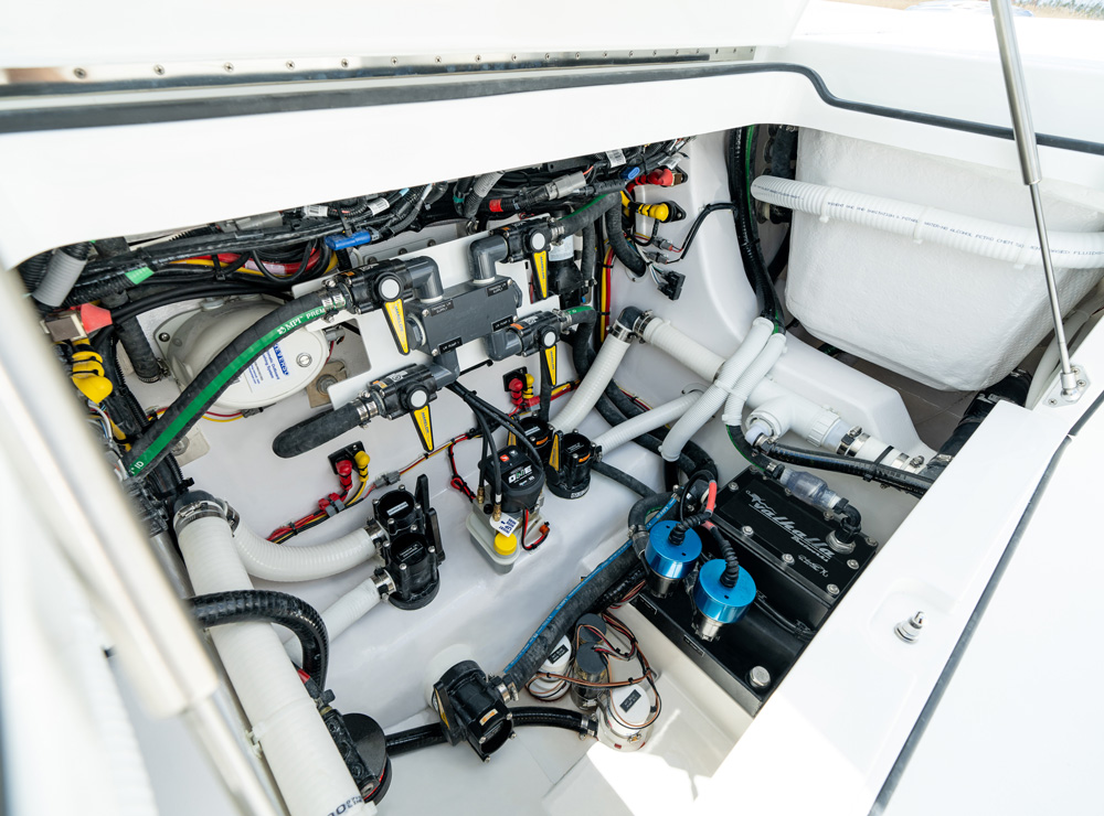 The Valhalla 29 Hybrid offers easy access to pumps and filters under the aft seat. 