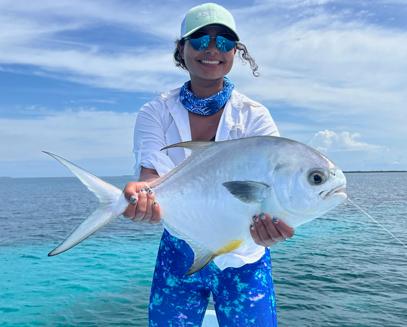 Mia Page Miles with a nice permit fish
