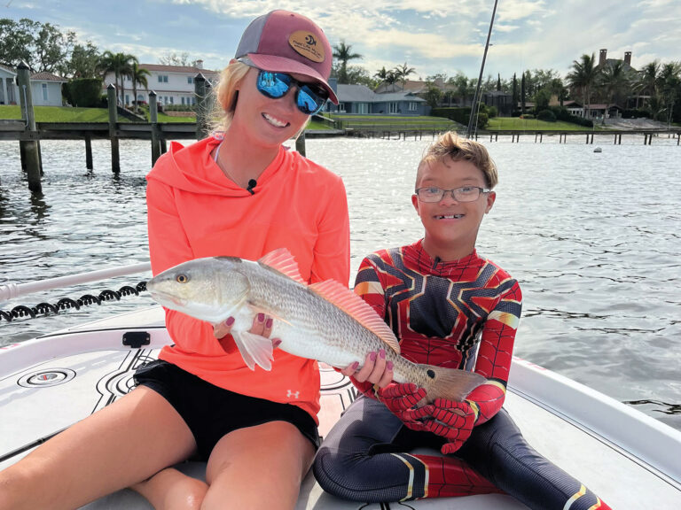 Chasten Whitfield and a young angler